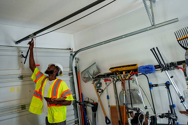 Professional Garage Door Panel Replacement technician working in Rossville, IN
